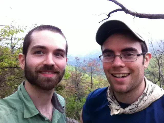 Wyatt and Tim smiling on the trail on day three